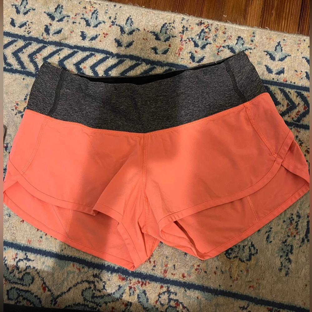 Lululemon pink coral ish color.